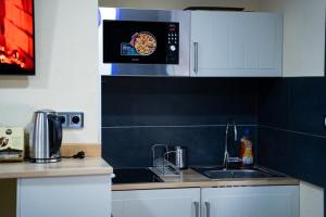 Appartements Appartement Jacuzzi : photos des chambres