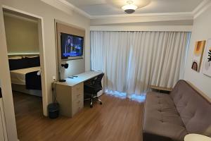 Flat Hotel The Palace com cozinha e sacada