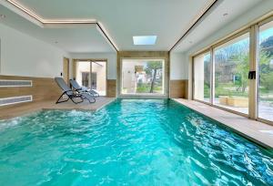 Villas L’Etoile de Dan, Piscine, Spa & Jeux : photos des chambres