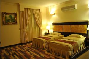 Capital O 155 Dmas Hotel