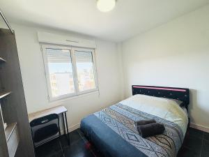 Appartements STUDIO A 300 METRES DE LA GARE et 25 MINUTES DE PARIS EN TRAIN : photos des chambres