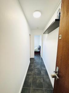 Appartements STUDIO A 300 METRES DE LA GARE et 25 MINUTES DE PARIS EN TRAIN : photos des chambres