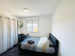 Appartements STUDIO A 300 METRES DE LA GARE et 25 MINUTES DE PARIS EN TRAIN : photos des chambres