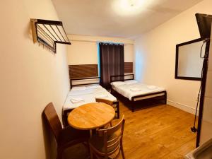 Quadruple Room with Private Bathroom room in Anwar House