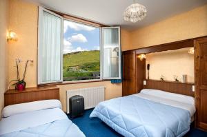 Hotels Le Relais de l'Aubrac : photos des chambres