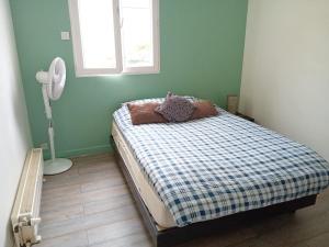 Appartement dans un pavillon avec accès au jardin