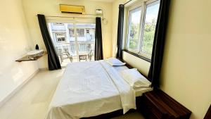 Serene Stays - 1 BHK 5 mins walk to the beach