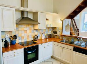 Maisons de vacances La maison du port : photos des chambres