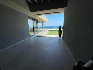 Sun and Sea Apartment - Beachfront, 2 Bedrooms with Sea View & Garden