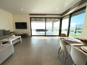 Sun and Sea Apartment - Beachfront, 2 Bedrooms with Sea View & Garden