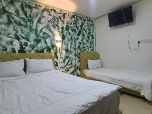 Hotel O Green Leaf Guest Lodge Kk
