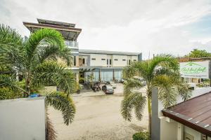 OYO 489 Casa Mia Hotel Suites