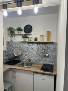 Appartements La maison des remparts : photos des chambres