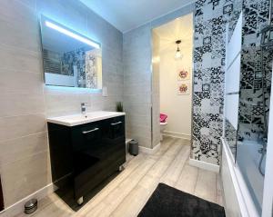 Appartements La maison des remparts : photos des chambres