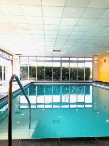 Appartements Le Fitness & Business Studio - Airbus -Piscine Spa : photos des chambres