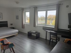 Appartements Le Fitness & Business Studio - Airbus -Piscine Spa : photos des chambres