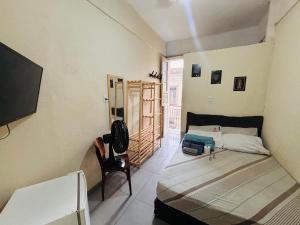 Pequena Suíte Individual 304