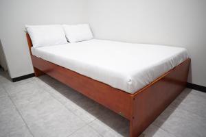 OYO Life 93045 Kost Putra Bu Ketut