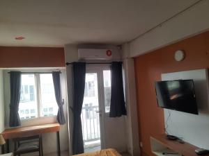 OYO Life 93140 Apartment Grand Sentraland By Fahri