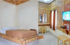 OYO 3303 Penginapan Putri Asih Sawarna - 西洛瓦