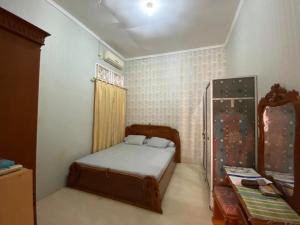 Hotel O Raudhatul Husna Homestay Syariah