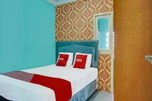 Hotel O Home Stay Elis Cateliya Syariah