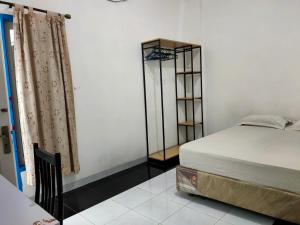Hotel O Wisma Aluh AmbakNearPantai batu lima Asbullah tmbngn