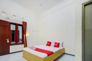 Capital O 90151 Guest House 180