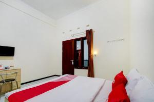 Capital O 90151 Guest House 180