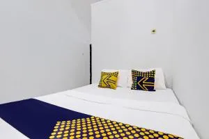 SPOT ON 92257 Orchid Guest House - Brono