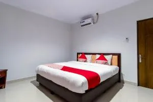 Super OYO 283 Helvetia Residence - 棉兰