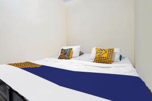 SPOT ON 91783 Urban Syariah ResidenceNearGOR Pandawa Lima