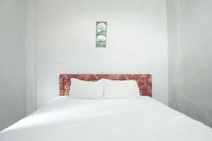 Hotel O Losmen Arkansas Syariah