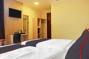 Phòng Hai Giường Đơn Loại Sang (Deluxe Twin Room)