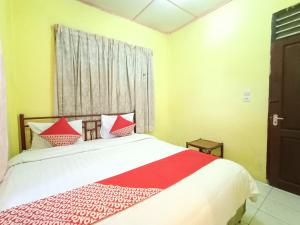 Hotel O Penginapan & Villa Sirait