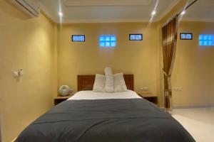 Capital O 93844 Arta Adi Homestay NearBali Zoo