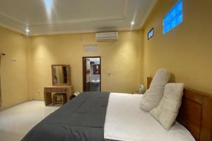 Capital O 93844 Arta Adi Homestay NearBali Zoo