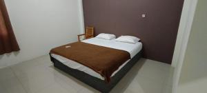 Hotel O Fanilly Guest House MarabahanNearJembatan Rumpiang