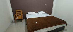 Hotel O Fanilly Guest House MarabahanNearJembatan Rumpiang