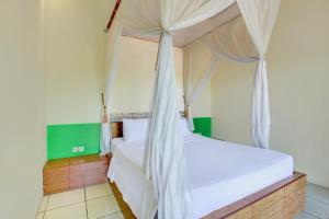 Capital O 94226 Kubu Mesari