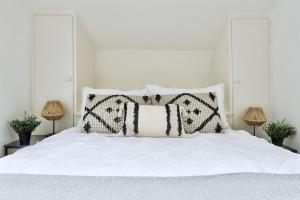 Appartements Le Nid Caladois - Centre-ville : photos des chambres