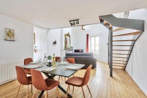Appartements Le Nid Caladois - Centre-ville : photos des chambres