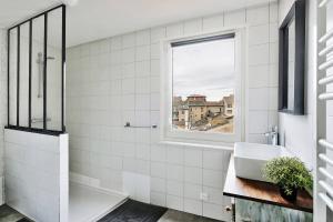 Appartements Le Nid Caladois - Centre-ville : photos des chambres