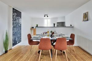 Appartements Le Nid Caladois - Centre-ville : photos des chambres