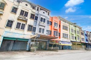 Capital O Pusat Kota Pekanbaru Near Mall Living World Formerly Radja Homestay