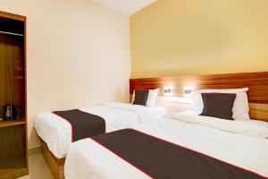 Capital O Pusat Kota Pekanbaru Near Mall Living World Formerly Radja Homestay