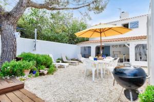 Maison pour 8 - 100 m de la plage - Jardin