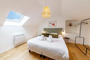 Appartements L'OPAL Wifi Teletravail Centre-ville : photos des chambres