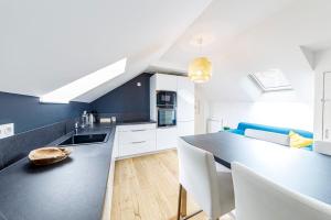 Appartements L'OPAL Wifi Teletravail Centre-ville : photos des chambres