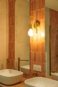 Appartements Suite Meraki - Luxe & Voyage - Jacuzzi & Cinema : photos des chambres